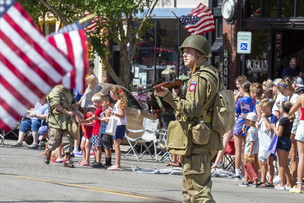 Hutchinson, Kansas, A soldier displays his weapon during the annual July 4 Patriots Parade in rural Kansas