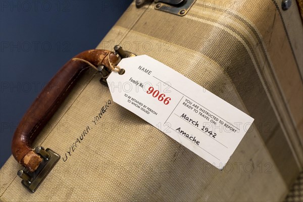 Granada, Colorado, The Amache Museum near the World War 2 Amache Japanese internment camp displays suitcases that internees brought with them when evicted from their homes. More than 7, 000 Japanese and Japanese-Americans were held at the site, one of 10 internment camps in the American west