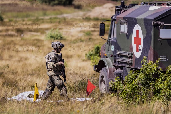 A soldier of the Jaegerbataillo photographed during an exercise of a combat situation at the Bundeswehr Combat Training Centre in Letzlingen, The soldiers wear AGDUS equipment