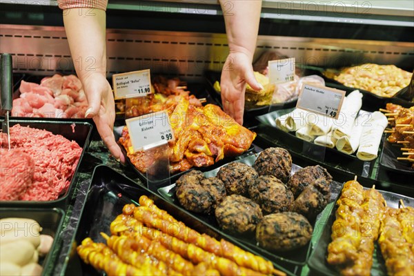 Meat and barbecue in the supermarket., Radevormwald, Germany, Europe