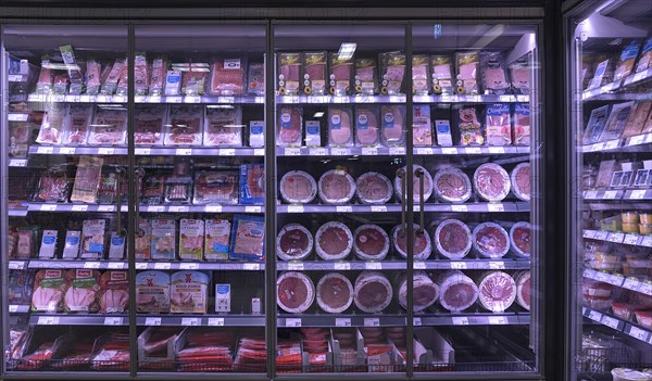 Sausages on offer in the refrigerated shelves in a supermarket, Bavaria, Germany, Europe