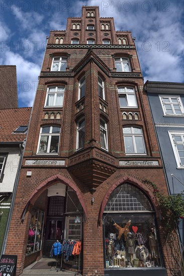 Brick residential and commercial building built 1900, Lueneburg, Lower Saxony, Germany, Europe