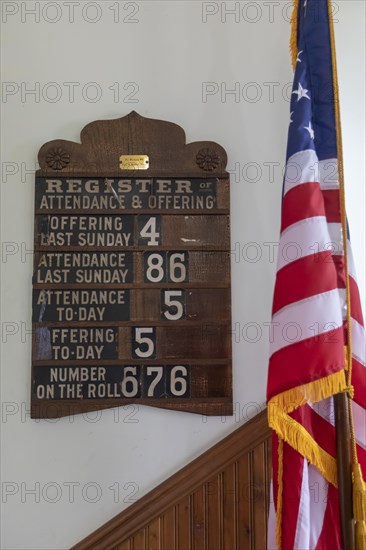 Beckley, West Virginia, Historic buildings are on display in the Coal Camp at the Beckley Exhibition Coal Mine. This coal camp church was built in 1921 in Pemberton, WV. A Register of Attendance & Offering is displayed by the churchs flag