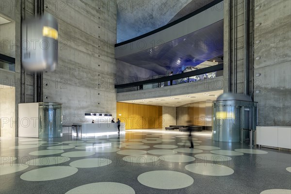 Foyer with futuristic lifts. Mercedes Museum, Stuttgarts most visited museum is part of the Mercedes-Benz World in Untertuerkheim and reminds us of the early days of the automobile with its vehicles and vintage cars, Architecture Ben van Berkel, Architekturbuero UNStudio, Stuttgart, Baden-Wuerttemberg, Germany, Europe