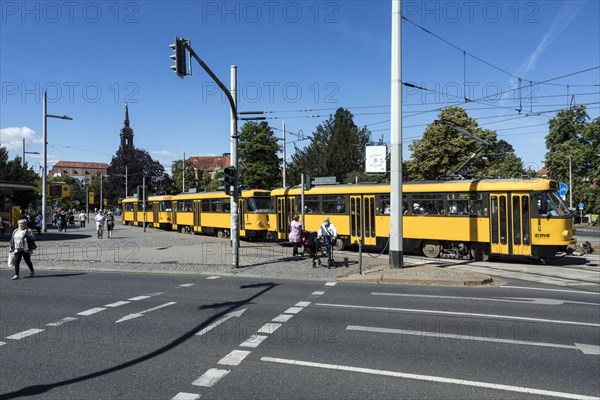 Pedestrian traffic lights at Albertplatz in Dresden during rush hour, in the background the Dreikoenigskirche, Dresden, Saxony, Germany, Europe