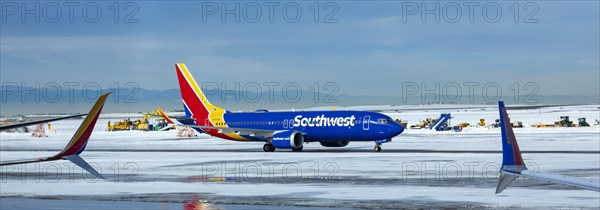 Denver, Colorado, Southwest Airlines jets on the ground after a snowstorm at Denver International Airport