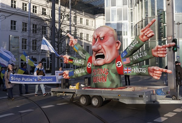 Stop Putin, Demonstration against the Ukraine war on 25.2.23., Mottowagen Karneval with Putin figure by Jacques Tilly, Duesseldorf, North Rhine-Westphalia, Germany, Europe