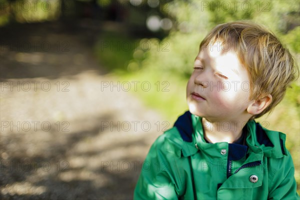 Toddler enjoying autumn sunshine. Bonn, Germany, Europe