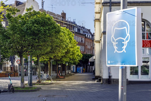 Mandatory masks in Duesseldorfs old town, here at Burgplatz, Duesseldorf, North Rhine-Westphalia, Germany, Europe