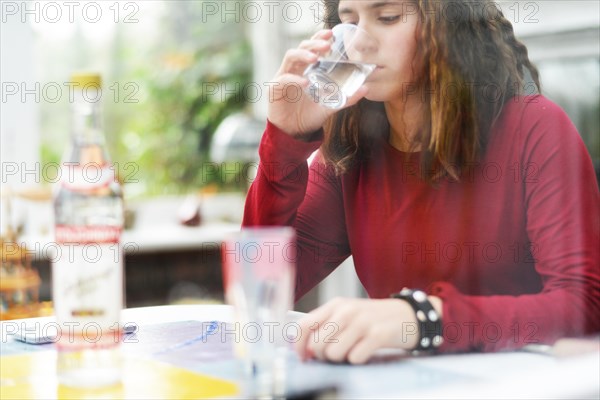 An 11-year-old girl stands as a model. Symbol photo alcoholism, Germany, Europe