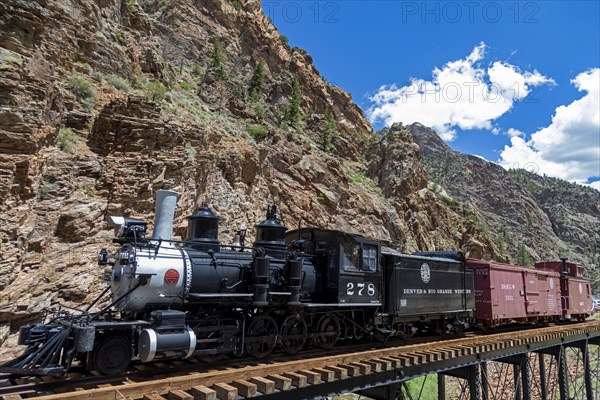 Cimmaron, Colorado, The Denver & Rio Grande Railroad is displayed on the last remaining trestle of the railroads historic route along the Black Canyon of the Gunnison. The railroad operated from 1882 to 1949