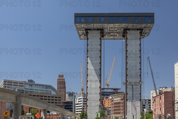 Detroit, Michigan, The Exchange, a 16-story apartment building being constructed from the top down in the Greektown neighborhood. Each floor is assembled on the ground, and then lifted into place