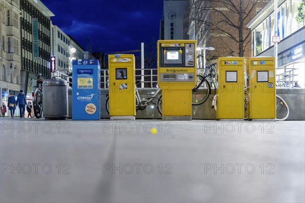 Letterbox and stamp machine of Deutsche Post and a regional postal service provider, blue CityPost, Hanover, Lower Saxony, Germany, Europe