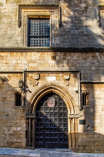 Gate to the French Hostel, Knights Street in Old Town from the time of the Order of St. John, the only surviving 16th century street in the late Gothic style, Oddos Ippoton, Rhodes Town, Greece, Europe