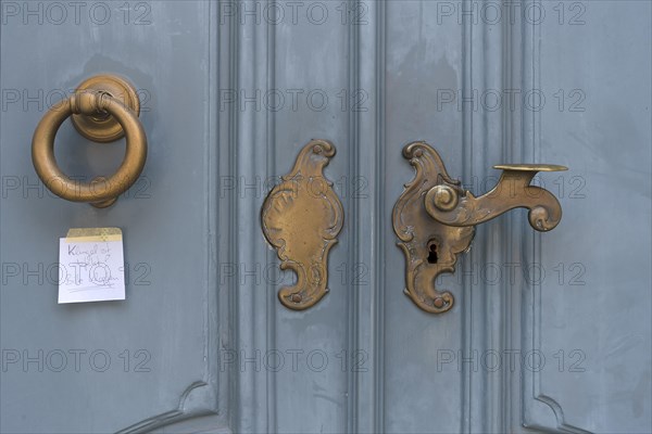Historic brass door lock and knocker, Lueneburg, Lower Saxony, Germany, Europe