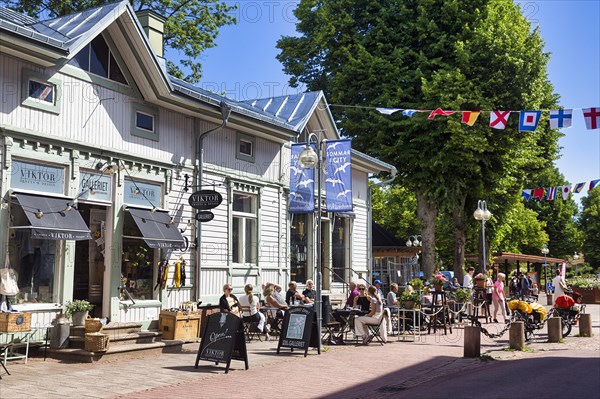 Pedestrian zone with cafe in summer, tourists, Mariehamn, Aland Islands, Aland, Finland, Europe