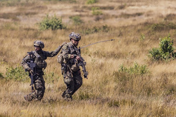 Soldiers of the Jaegerbataillon 292 train a combat situation at the Bundeswehr Combat Training Centre in Letzling The soldiers wear AGDUS equipment