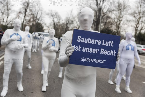 Protest of the environmental organisation Greenpeace, on the Bundesstrasse 14 40 activists demand better air quality, the Neckartor is considered the most polluted street in Germany with high levels of particulate matter, climate change, Stuttgart Baden-Wuerttemberg, Germany, Europe