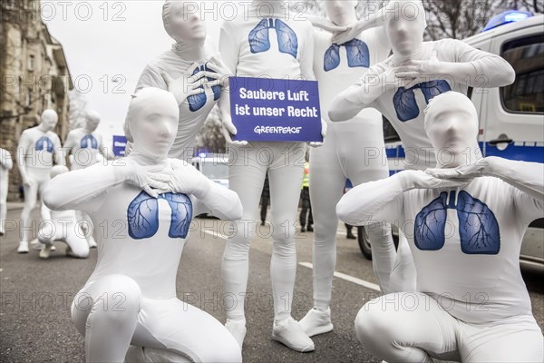 Protest of the environmental organisation Greenpeace, on the Bundesstrasse 14 40 activists demand better air quality, the Neckartor is considered the most polluted street in Germany with high levels of particulate matter, climate change, Stuttgart Baden-Wuerttemberg, Germany, Europe