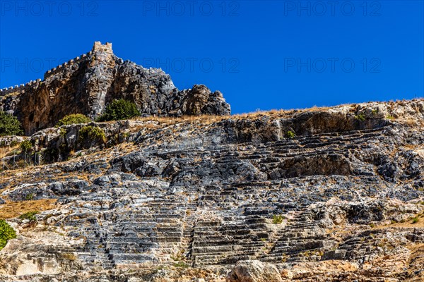 Ancient theatre from the 4th century with over 25 rows of seats for 2000 visitors, Lindos, Rhodes, Greece, Europe