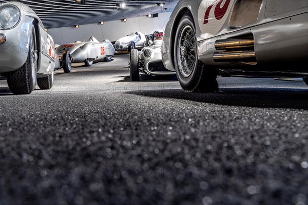 Silver Arrows - Races and Records. Mercedes Museum, Stuttgarts most visited museum is part of the Mercedes-Benz World in Untertuerkheim and reminds us of the early days of the automobile with its vehicles and vintage cars, Architecture Ben van Berkel, Architekturbuero UNStudio, Stuttgart, Baden-Wuerttemberg, Germany, Europe