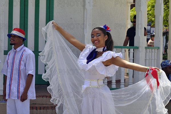 Dancer of the local dance group for tourists, in the Parque Independenzia in the Centro Historico, Old Town of Puerto Plata, Dominican Republic, Caribbean, Central America