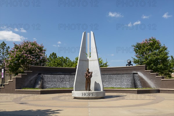 Tulsa, Oklahoma, Hope Plaza at John Hope Franklin Reconciliation Park. The park is a memorial based on the 1921 race massacre in which many African-Americans were murdered and the Greenwood District burned to the ground. The plazas sculpture includes three figures from the race massacre representing Humiliation, Hostility, and Hope