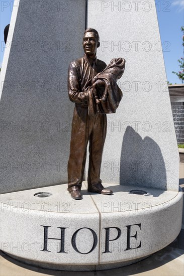 Tulsa, Oklahoma, Hope Plaza at John Hope Franklin Reconciliation Park. The park is a memorial based on the 1921 race massacre in which many African-Americans were murdered and the Greenwood District burned to the ground. The plazas sculpture includes three figures from the race massacre representing Humiliation, Hostility, and Hope