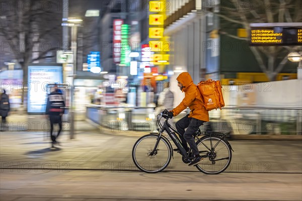 Bike courier from Lieferando on the road with bike, Rider, Stuttgart, Baden-Wuerttemberg, Germany, Europe