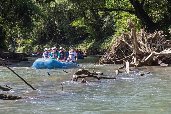 Muelle San Carlos, Costa Rica, Tourists on a scenic rafting trip on the Rio Penas Blancas, Central America