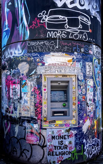 Graffiti on the ATM, RAW grounds, Friedrichshain, Berlin, Germany, Europe