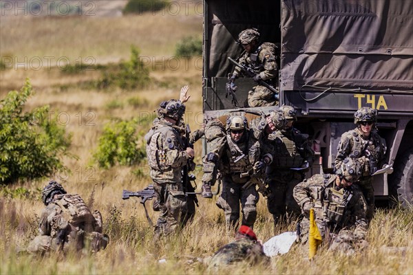 Soldiers of the Jaegerbataillo taken during a rescue of casualties in the context of a simulated combat situation at the Bundeswehr Combat Training Centre in Letzlingen, The soldiers wear AGDUS equipment