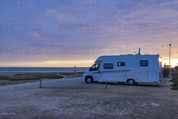 Motorhome at sunset on a motorhome pitch by the sea, Portbail, Normandy, France, Europe
