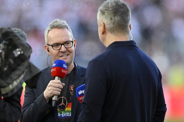 Chief Sports Officer Alexander Wehrle VfB Stuttgart in interview microphone logo SKY in special jersey, diversity LGBT diversity rainbow, Mercedes-Benz Arena, Stuttgart, Baden-Wuerttemberg, Germany, Europe