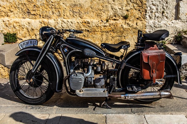 Vintage motorbike in Old Town alley, Rhodes Town, Greece, Europe