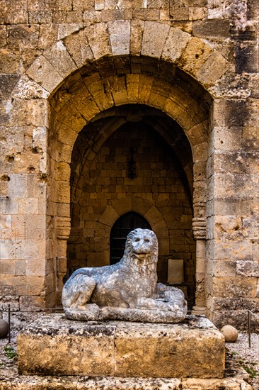 Tomb statue of a lion holding a bulls head in its paws, late Hellenistic period, Archaeological Museum in the former Order of St John Hospital, 15th century, Old Town, Rhodes Town, Greece, Europe