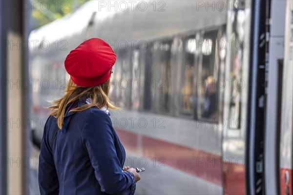 Train supervisor, Deutsche Bahn employee with red cap, Stuttgart main station, Baden-Wuerttemberg, Germany, Europe