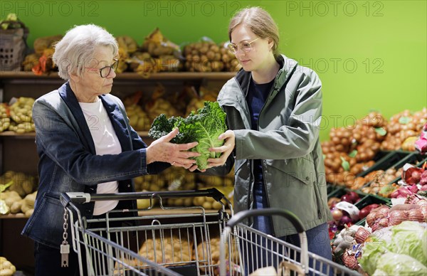 Elderly woman gets support in supermarket, Radevormwald, Germany, Europe