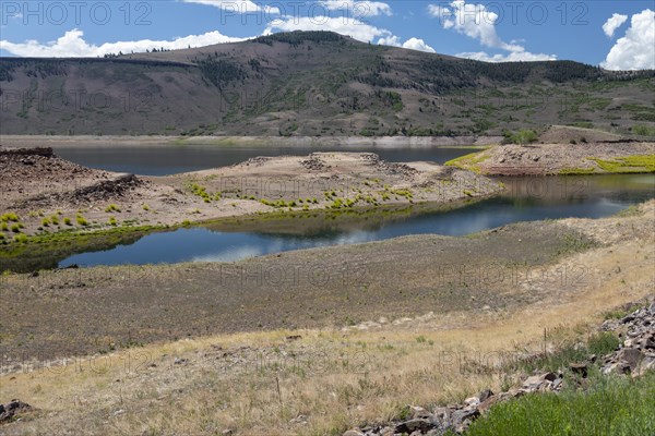 Gunnison, Colorado, The drought affecting the American west has dramatically dropped water levels on Blue Mesa Reservoir in Curecanti National Recreation Area, as water is released to keep up the level of Lake Powell. The lighter ground in this photo was mostly underwater at full pool