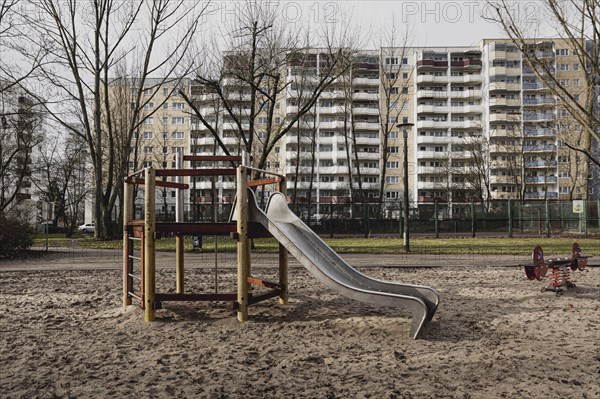 Abandoned playground in front of prefabricated buildings in the Marzahn district, photographed in Berlin, 01.02.2023., Berlin, Germany, Europe