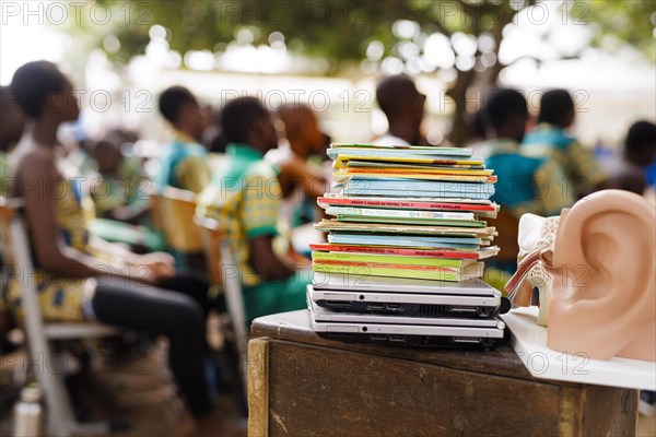 Topic: School children in Africa. Stack of notebooks and books, Krokrobite, Ghana, Africa