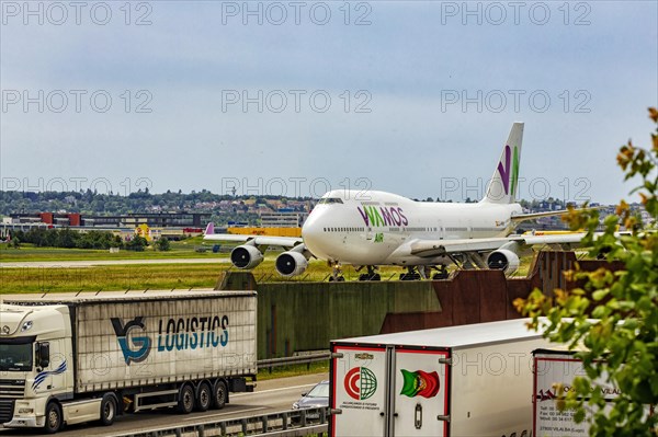 Boeing 747-400 cargo aircraft, taxiway, good infrastructure due to nearby motorway, Stuttgart Airport, Baden-Wuerttemberg, Germany, Europe