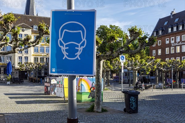 Mandatory masks in Duesseldorfs old town, here at Burgplatz, Duesseldorf, North Rhine-Westphalia, Germany, Europe