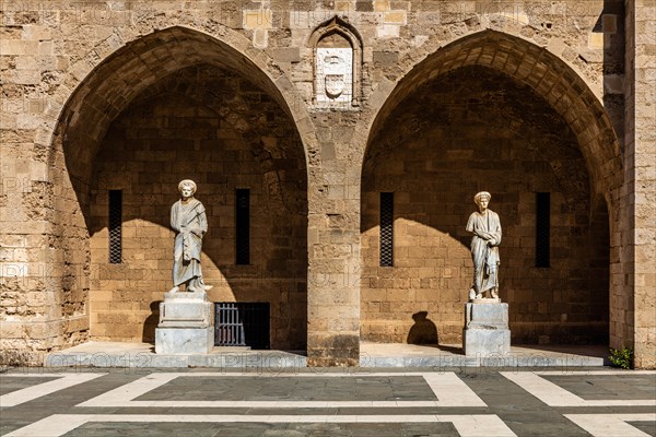 Inner courtyard surrounded by arcades with statues from Hellenistic and Roman times, Grand Masters Palace built in the 14th century by the Johnnite Order, fortress and palace for the Grand Master, UNESCO World Heritage Site, Old Town, Rhodes Town, Greece, Europe