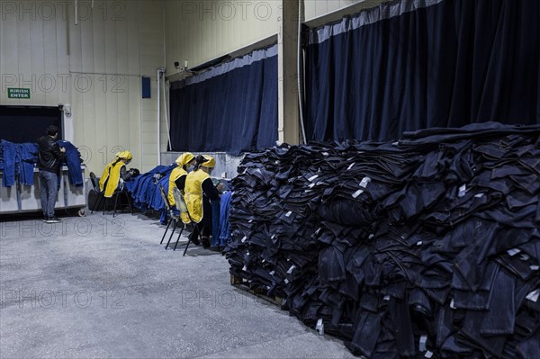 Women workers produce jeans at the Afrasyab jeans factory in Samarkand, 02.11.2022., Samarkand, Uzbekistan, Asia