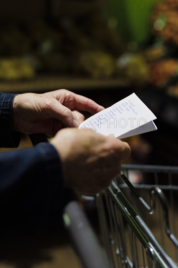 Shopping list in the supermarket., Radevormwald, Germany, Europe