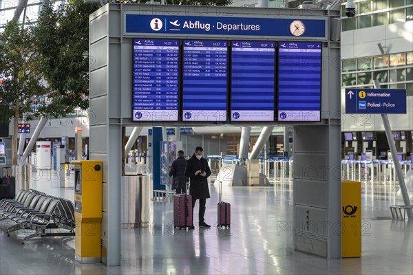 Duesseldorf Airport, DUS, departure hall, terminal, display board, Airport International in lockdown during Corona crisis, hardly any traffic and only few departure connections due to travel restrictions, Duesseldorf, North Rhine-Westphalia, Germany, Europe