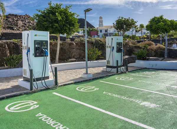 Green parking area with Iberdrola charging station for electric car, Lanzarote, Canary Islands, Spain, Europe