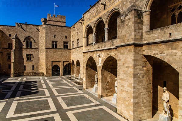 Inner courtyard surrounded by arcades with statues from Hellenistic and Roman times, Grand Masters Palace built in the 14th century by the Johnnite Order, fortress and palace for the Grand Master, UNESCO World Heritage Site, Old Town, Rhodes Town, Greece, Europe