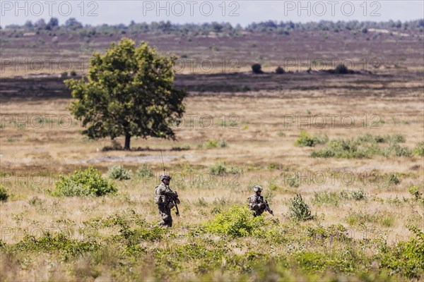 Soldiers of the Jaegerbataillon 292 train a combat situation at the Bundeswehr Combat Training Centre in Letzling The soldiers wear AGDUS equipment